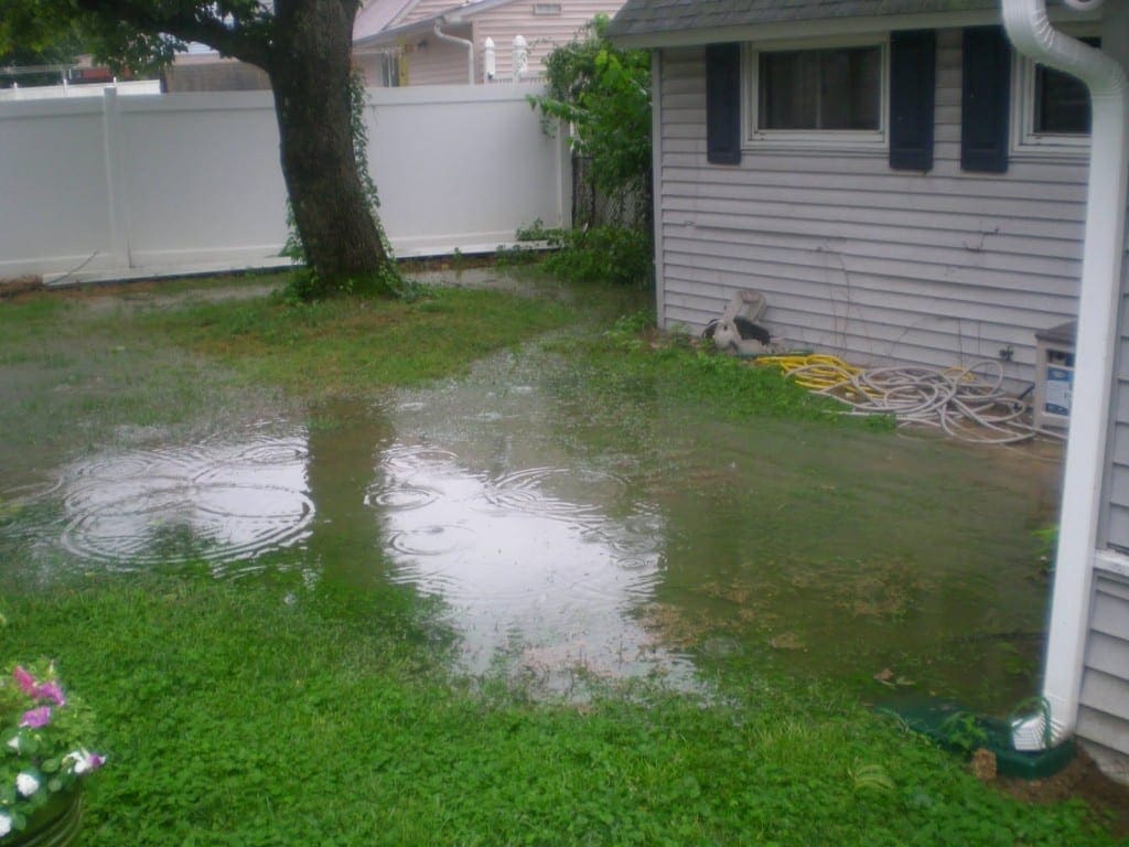 water pooling backyard Yard Drainage Solutions