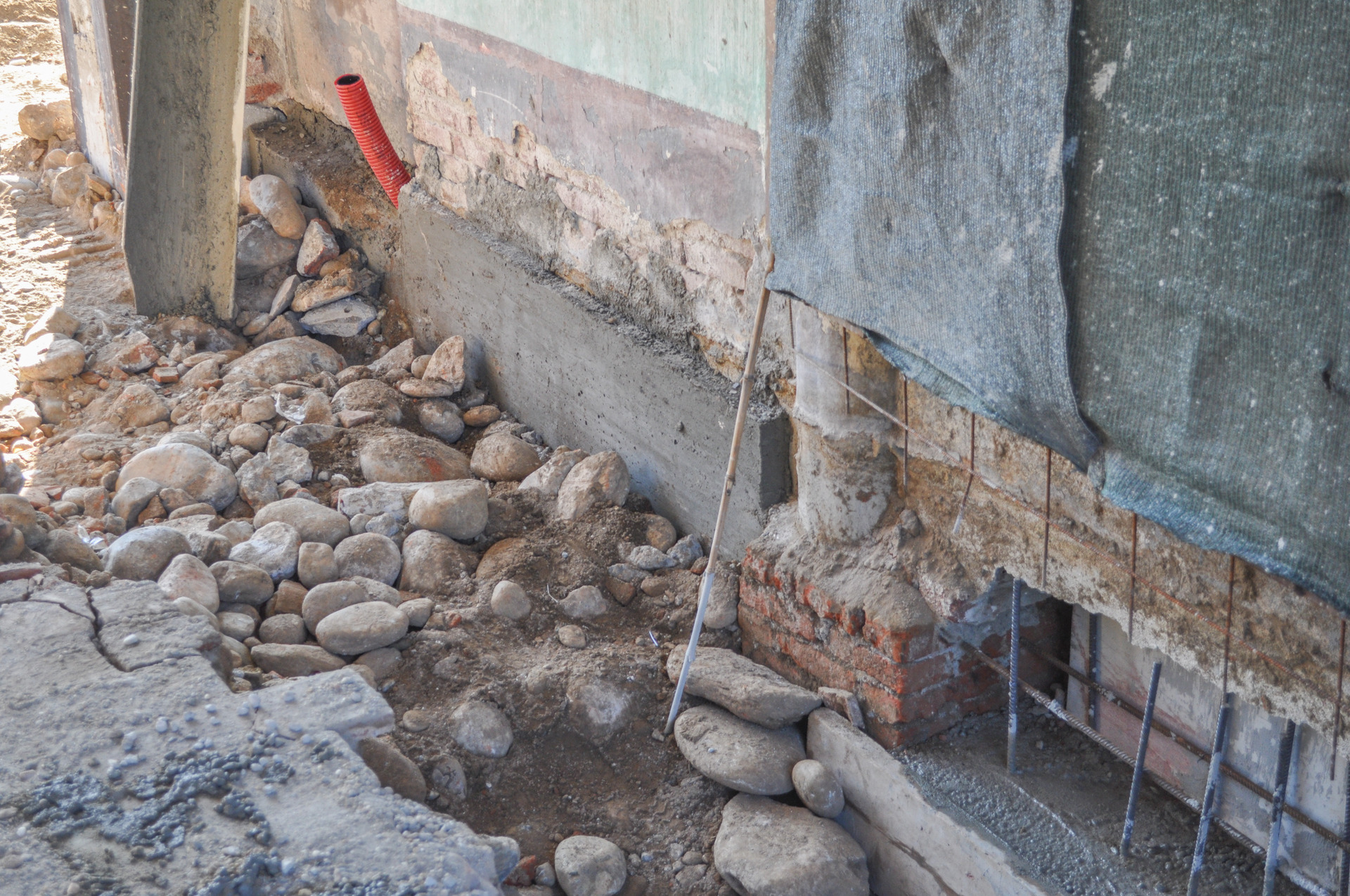 Underpinning for strengthening the foundation of an existing building Foundation Underpinning